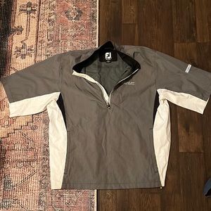 Footjoy dry joy short sleeve rain jacket.